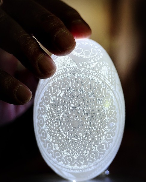 Artist Franc Grom drilled nearly 20,000 tiny holes into this egg.