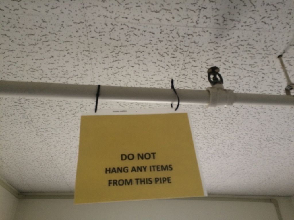 wall - Do Not Hang Any Items From This Pipe