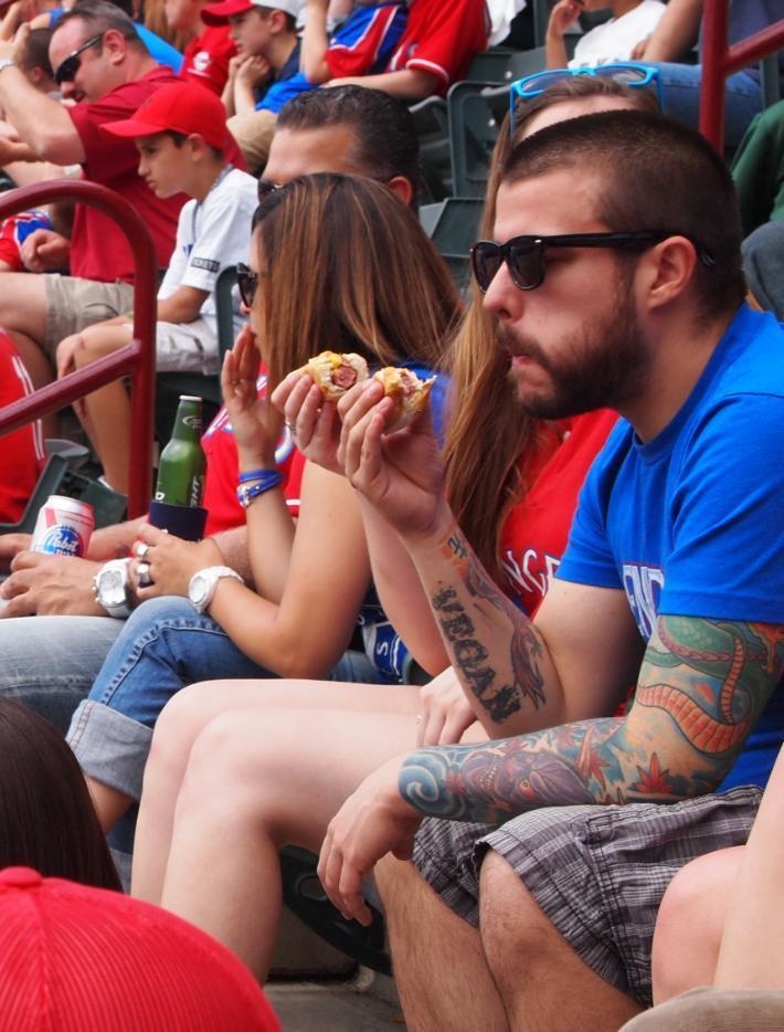 vegan eating hotdog