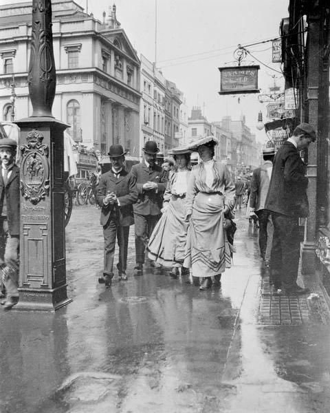 The crowded -- and extraordinarily well-dressed streets of London in the 1900s.