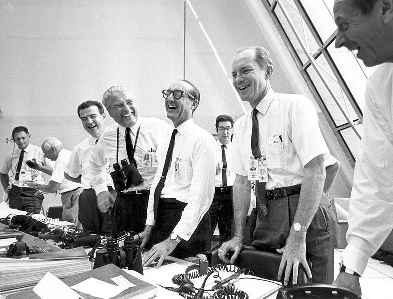 Apollo 11 mission officials celebrate the spacecraft's successful launch on July 16, 1969.