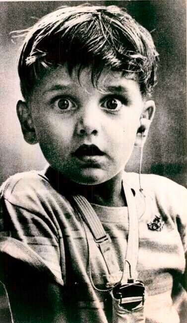 The exact moment five year old Harold Whittles hears for the very first time after doctors place an aid in his left ear.