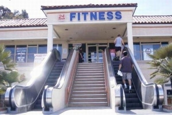 escalator in front of gym - 24 Fitness