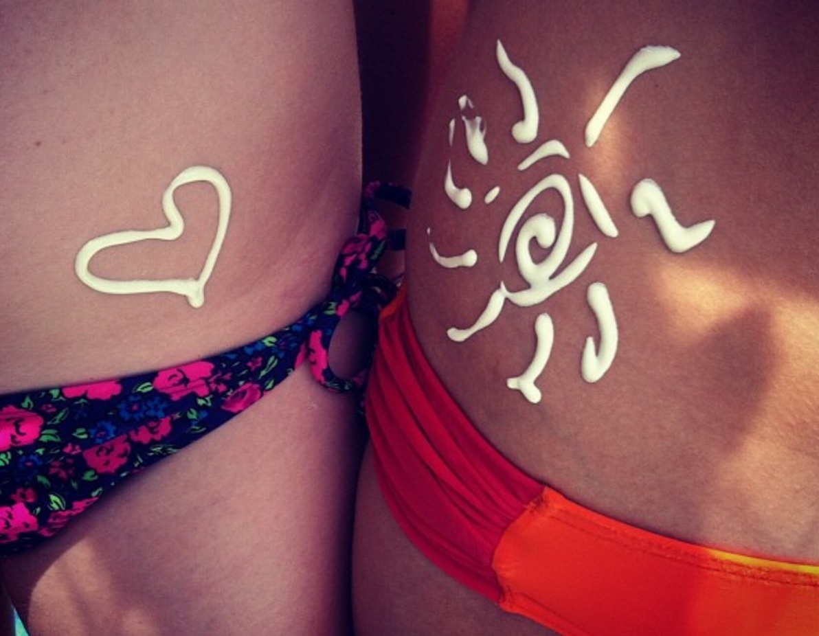 You can use Elmer's glue to create a design that will show up when you're done tanning.