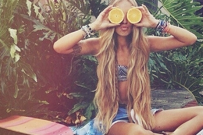 Use a bit of lemon juice to enhance the sun's lightening powers on your hair.
