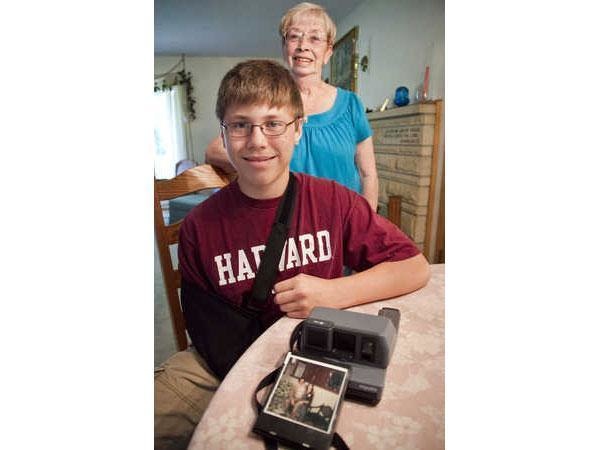 This young boy bought a Polaroid camera at a yard sale for $1. He removed the cartridge and found a photo of his uncle who died in a car accident 23 years earlier.