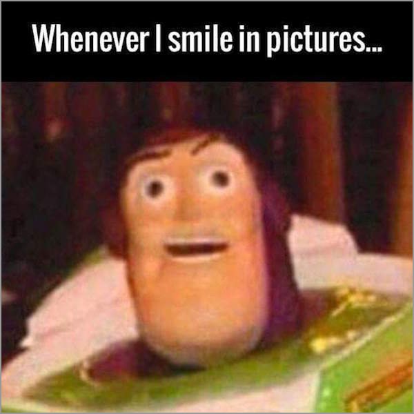 buzz lightyear rape face - Whenever I smile in pictures...