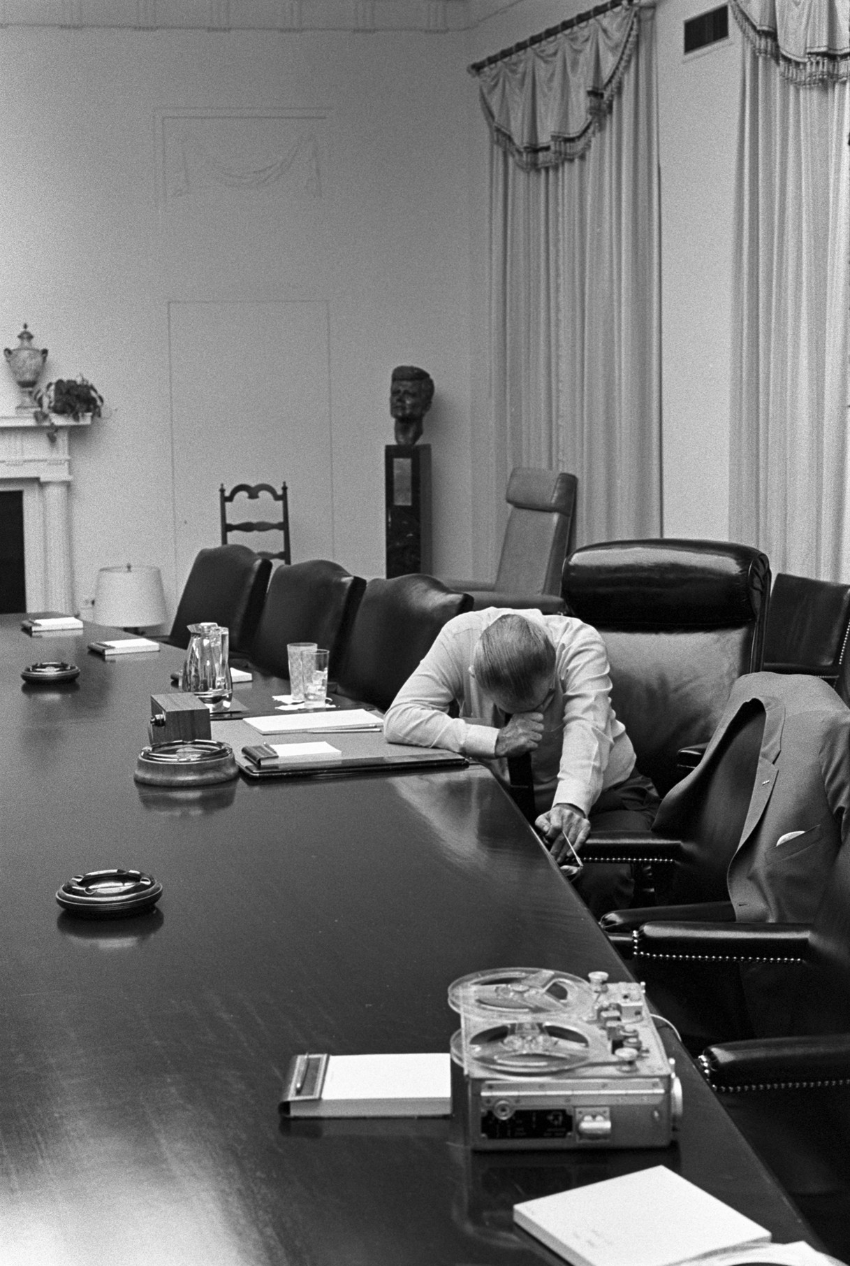 Lyndon B. Johnson cries as he listens to his son-in-law describe conditions in Vietnam. 1968