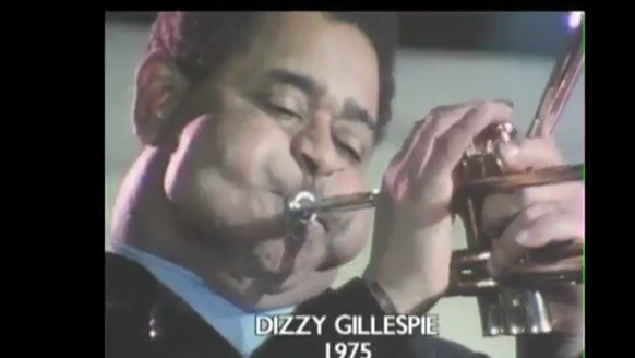 Dizzy Gillespie’s cheeks while playing the trumpet