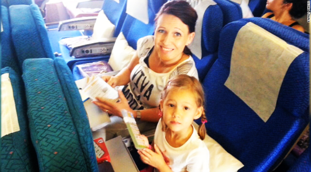 Dave Hally took one last photo of his wife and 4-year-old daughter before takeoff for their dream vacation aboard MH17