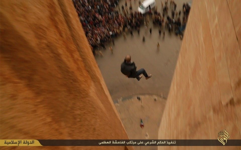 Last photo of a gay man being executed by ISIS by being thrown off a building. You can see another body below