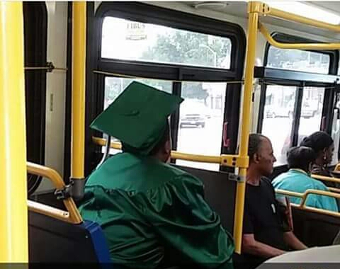 Kid taking the bus to his graduation