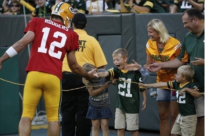 When you get a high five from a member of your favorite football team.