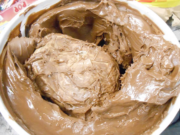 U.S. Customs officers in Cincinnati have found drugs hidden in the weirdest places. Officials used an X-ray on a tub of chocolate icing after finding some irregularities—they discovered a sealed back with 2.5 pounds of heroin inside the chocolate.

Other recent smuggling attempts include methamphetamines hidden in ceramic statues, tortilla presses, and toy Ferris wheels.