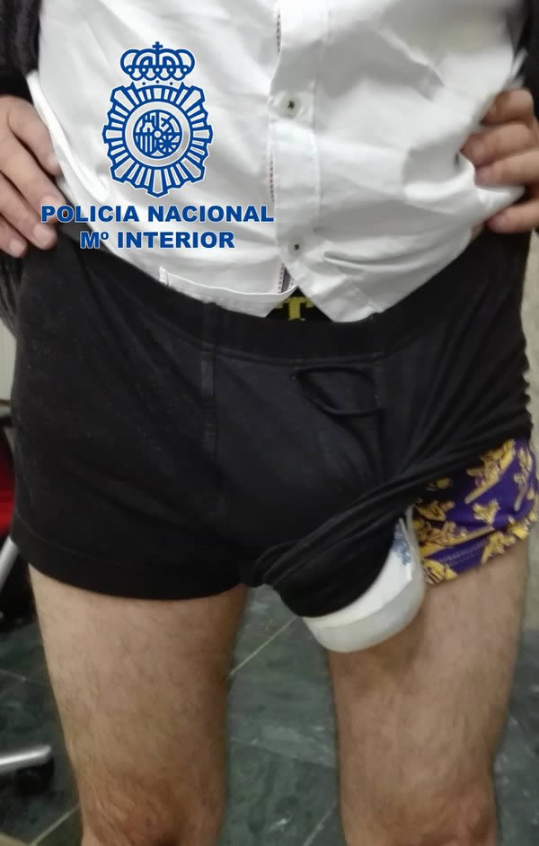 The old joke, "Is that a bulge in your pants or are you just happy to see me?" has new meaning these days.

Police officers in Spain arrested a male passenger upon landing in Madrid after noticing a rather large bulge in his pants between his legs. After further inspection, police found almost half a kilo of cocaine. The 43-year-old man was traveling from Costa Rica when he was stopped.
Police initially found nothing during a routine bag search but grew suspicious when they saw the aforementioned bulge.