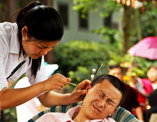 In India, people can have their ears cleaned by a specialist known as an ear cleaner. First, the cleaner examines your ear with a brass pick, and then he removes all the ear wax.