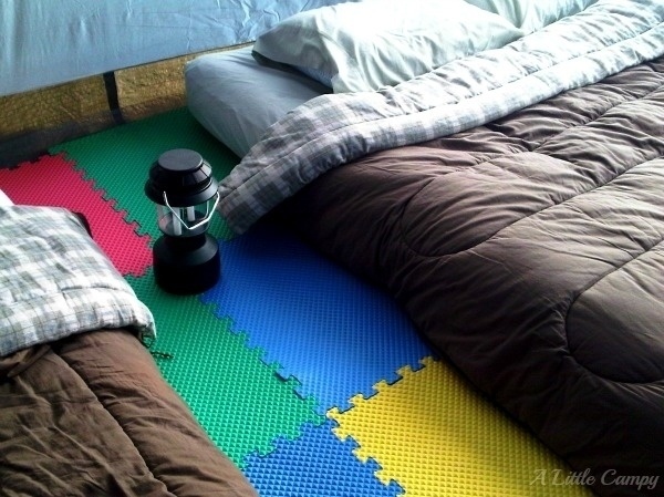 Put foam floor tiles on the floor of your tent.

This will make it way more comfortable and super soft.