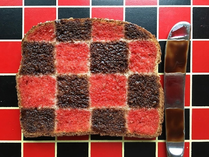 A slice of bread camouflaged with the checker board.