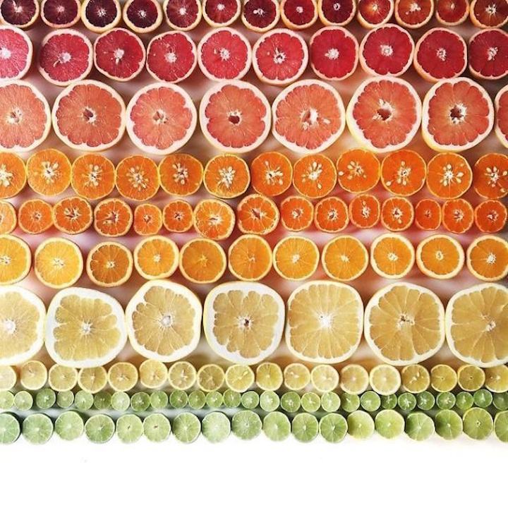 Circular fruits in various sizes and colors.