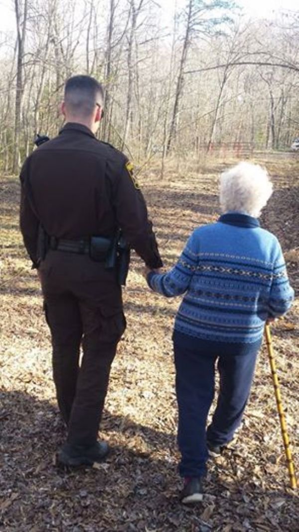 police helping old woman