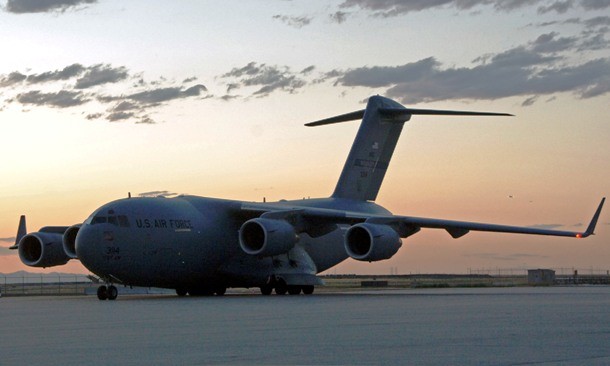 Kevin Fast from Canada pulled a CC-177 Globemaster III, a large military transport aircraft weighing 188.83 tons (416,299 pounds), a distance of 8.8 meters (28 feet, 10.46 inches) at Canadian Forces Base in Trenton, Ontario, Canada, on 17 September 2009.