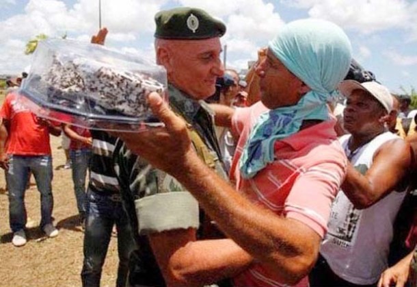 During a protest in Brazil, an officer asked the protesters not to fight on his birthday. Shortly after, they surprised him with a birthday cake.