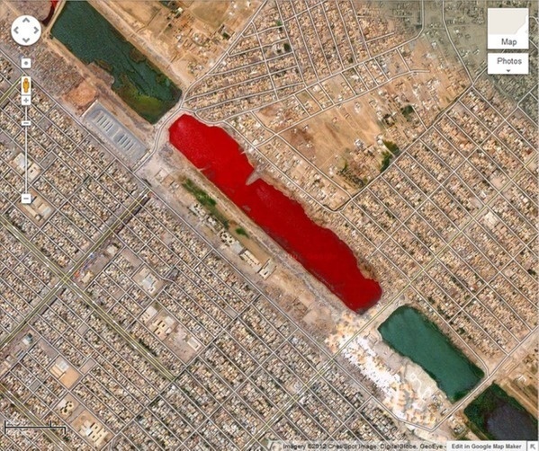 Then there's the pesky issue of this lake.

Sadr City in Iraq has a blood-red lake that no one can explain. It looks like a building, but nope. You could go swimming in there.