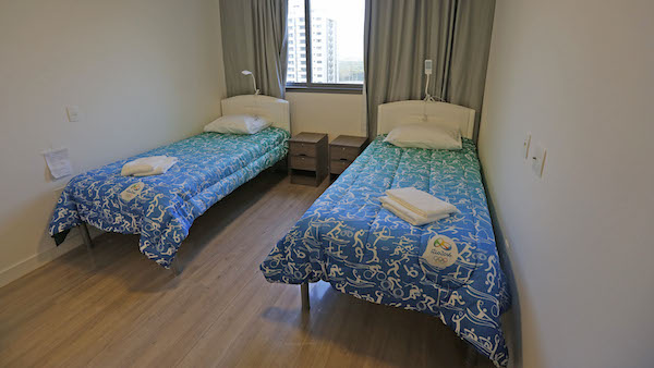 The Australian delegation refused to enter the facilities at Olympic Village due to serious issues with plumbing and fire safety. When the athletes arrived and intended to check into their rooms, they found water flowing down the walls after flushing the toilets, a strong smell of gas, and exposed wiring. The team is currently staying in hotels while awaiting their accommodations for the games.