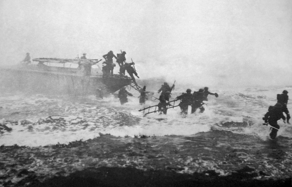 British Army Officer Jack Churchill (far right) leading a charge with a Scottish broadsword in his hand in Inverary. (circa 1940)