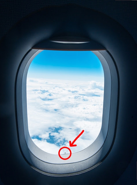 That tiny hole in your airplane window isn't there to scare you.

Inside and outside pressure while flying is regulated with a tiny hole on your plane window. Don't worry -- unless the hole suddenly gets bigger. Then you should definitely worry.