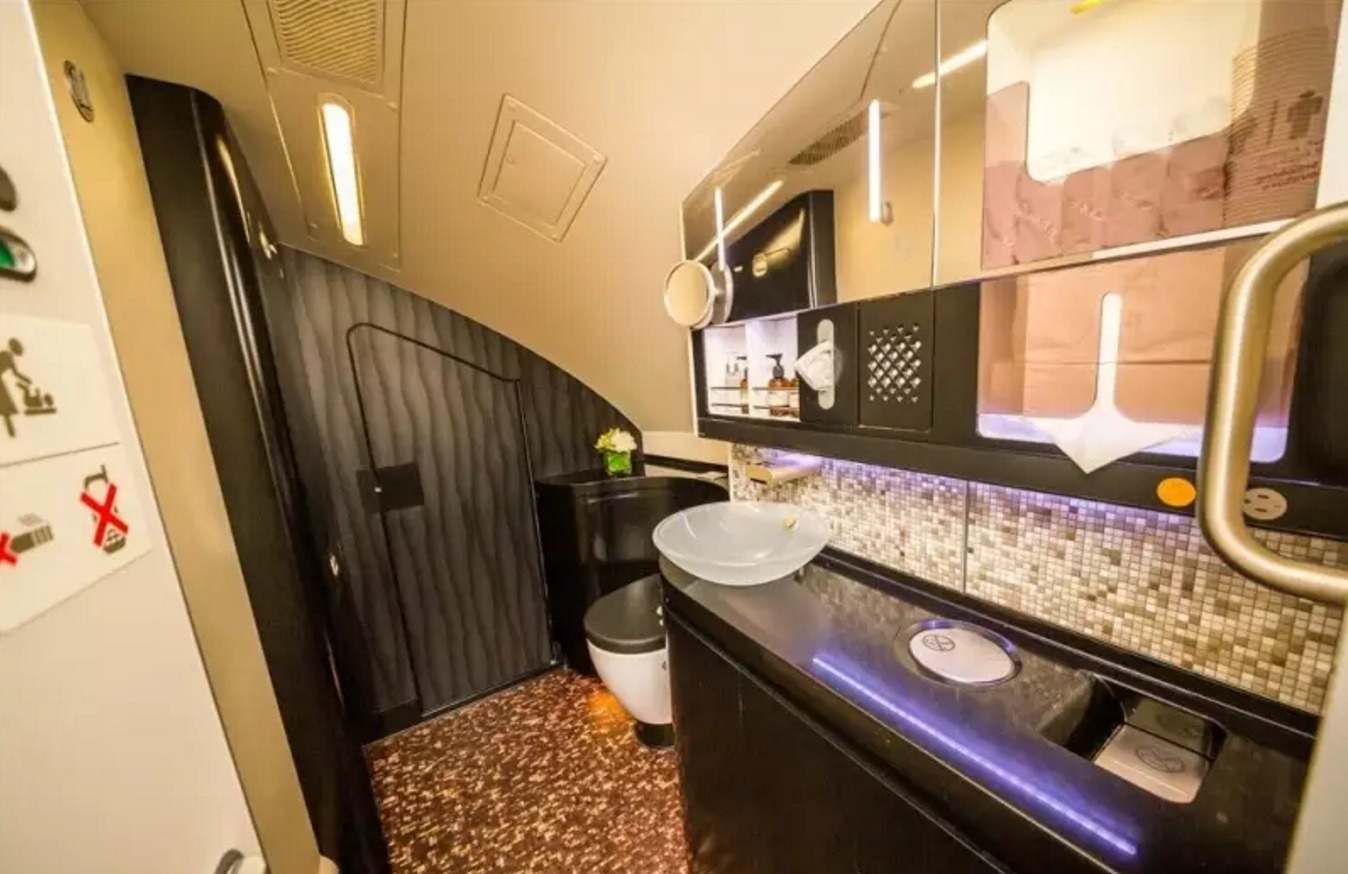 First Class restrooms offer the perfect mood.

With quality lighting and luxurious toiletries, you won't be rushing back to your seat anytime soon. Next, check out the area that would cost you nearly $40,000.