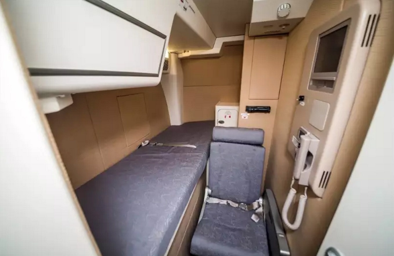 Step outside the cockpit and you'll find a bed and couch for the pilot.