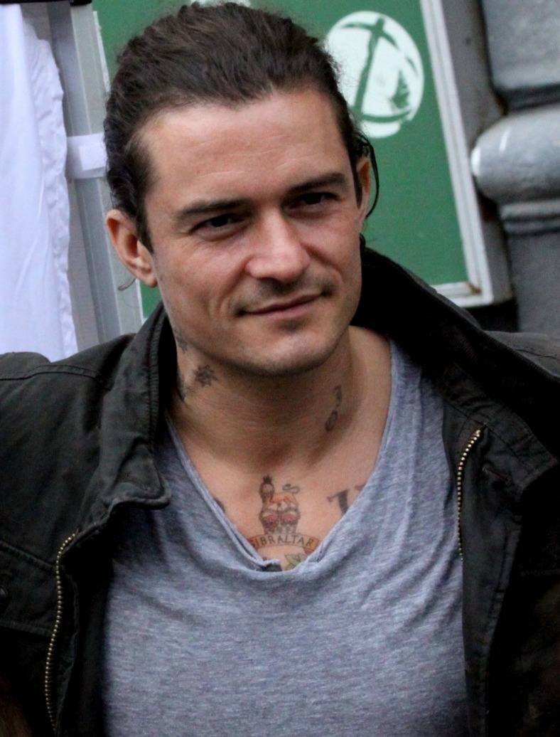 Orlando Bloom.

His near-death occurrence came when he climbed three stories up a drainpipe when suddenly it collapsed and he fell to the ground. He fractured his back in several places, and was told he'd never walk again. Luckily, that proved to be untrue.