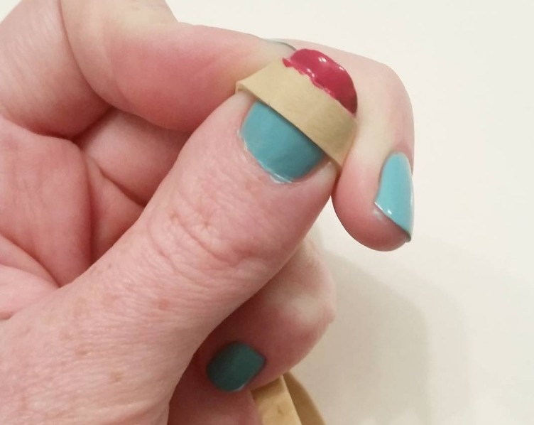 For the perfect french tip, paint over a big rubberband.
Or you can use tape as well!