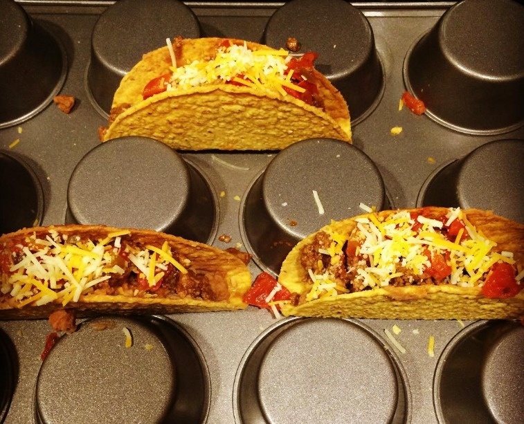 Instead of serving tacos laying on their side on a plate, use a muffin tin to serve them upright.
Just flip the muffin tin upside down and place the tacos in between the blocks.