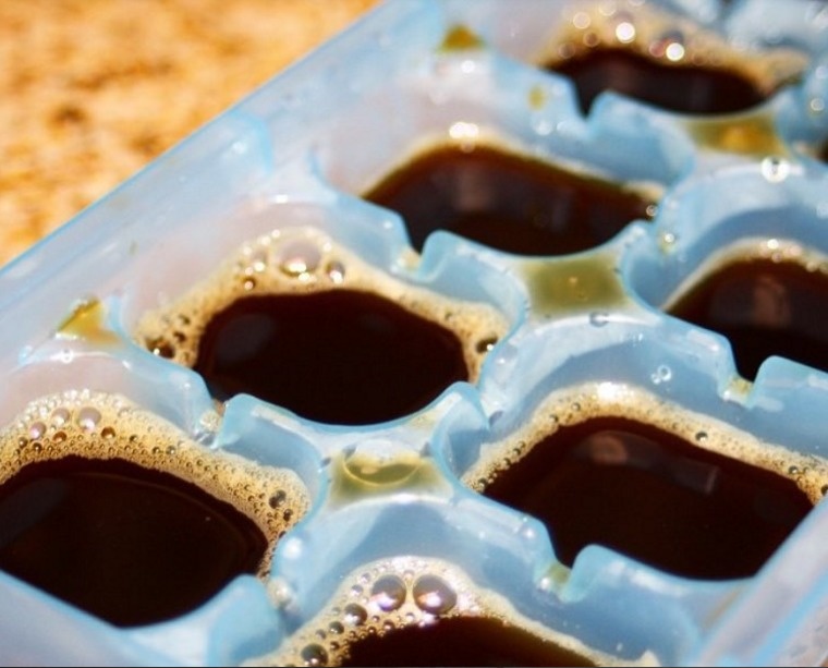 If you like to drink iced coffee, freeze your coffee leftovers in an ice cube tray.
And then use these special ice cubes for your next coffee, this way it doesn't dilute your drink.