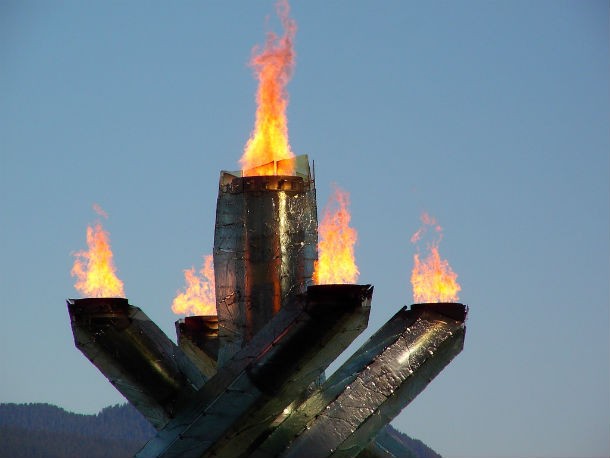 The Olympic flame might have appeared for the first time in the Summer Olympics of 1928 in Amsterdam but it’s a tradition and practice that has its roots in antiquity. In Olympia (Greece), a flame was ignited by the sun and then kept burning until the closing of the ancient Games. The flame itself represents a number of things, including purity and the endeavor for perfection.