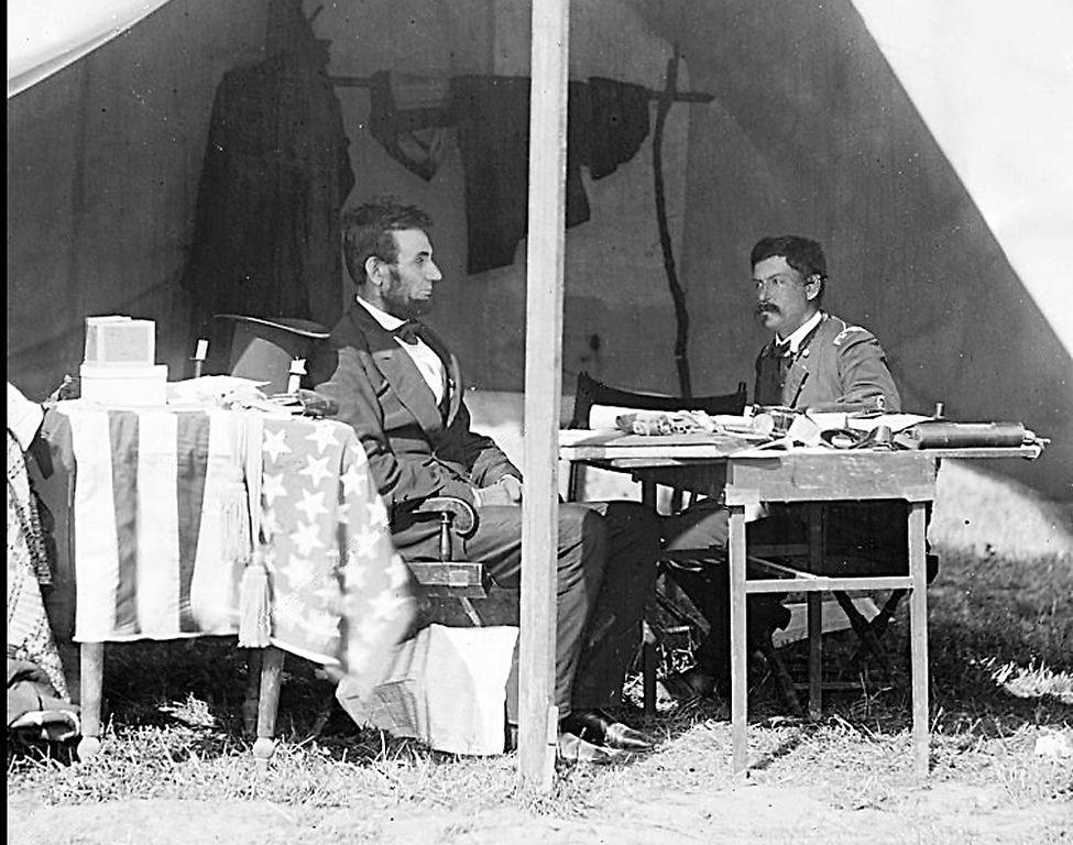President Abraham Lincoln and General George McClellan in a general’s tent during the Battle of Antietam, 1862