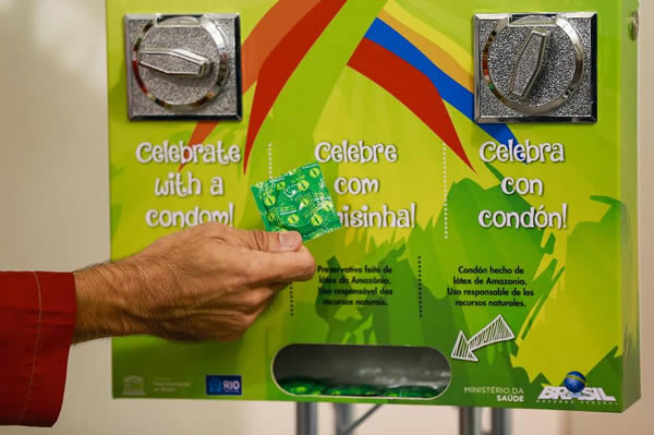 Seventeen days, 10,500 athletes, 33 venues, and 450,000 condoms. That's how many camisinhas ("little shirts") are being supplied by the International Olympics Committee for the 2016 Rio Summer Games. That's 42 per athlete, which — even by Olympic standards — is a hell of a lot.

Welcome to the most promiscuous Olympics in history. The provision of 350,000 men's condoms, 100,000 female condoms, and 175,000 packets of lubricant for Rio's Olympic Village is three times higher than the London 2012 Games' allowance of 150,000, which prompted tabloids to dub the event “the raunchiest ever."

The latex count began in Seoul in 1988, when 8,500 condoms were distributed to athletes. Reports of rubbers found on the roofs of Olympic residences led to the powers that be banning outdoor sex. Since then, the number of condoms provided has jumped around more than a gold-medal gymnast: 90,000 to Barcelona in 1992 and 15,000 to Atlanta in 1996. In Sydney 2000, Australian organizers ordered 70,000 condoms but a further 20,000 were brought in when they ran out halfway through the Games. In Athens 2004, Durex donated 130,000 condoms “to smooth the performance of the world's elite sports people in the arena and under the covers."