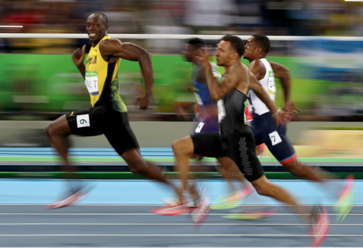 Usain Bolt smiles for the camera