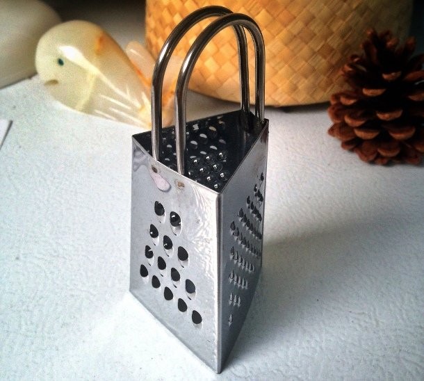 Don’t shred dish sponges while trying to clean your cheese grater any more. When you are done grating cheese, grate a piece of a potato with the grater. The oxalic acid of the potato will remove the cheese debris immediately.