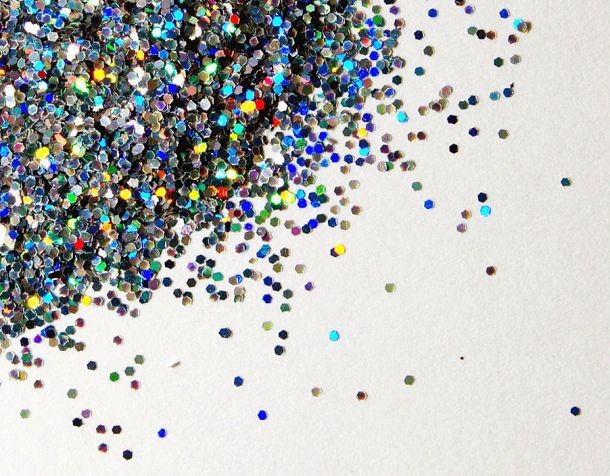 Spilled glitter or any other similar tiny particles can be easily picked up with play dough.