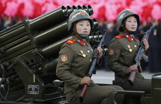 Here, soldiers with missiles move through Kim Il Sung Square in a 2015 parade. 
 There are lots of parades in North Korea, all celebrating the ruling party.