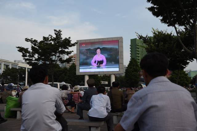 In North Korea, missile tests and military exercises are treated like sporting events, broadcast in public for everyone to witness.