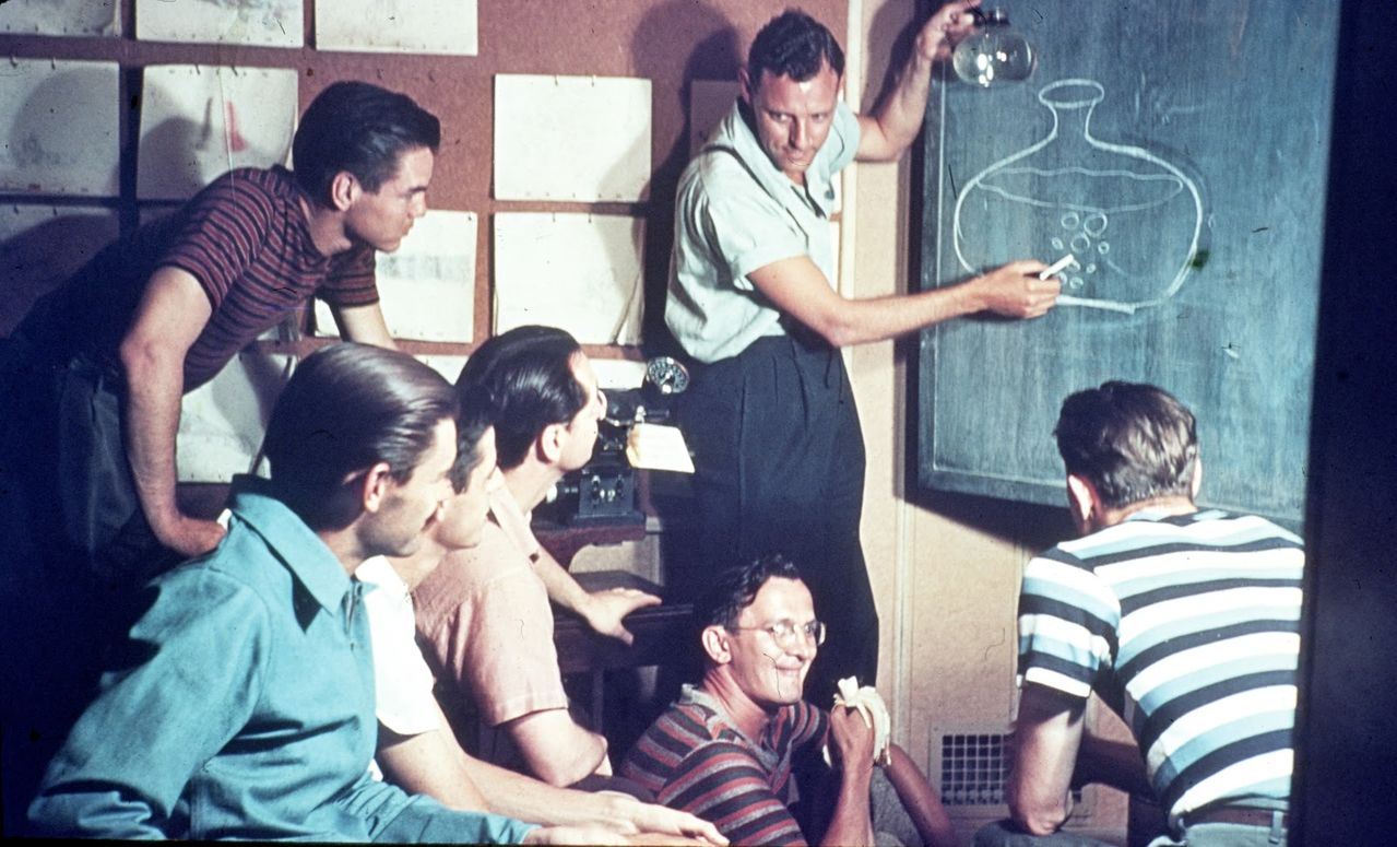 Disney animators attend a meeting on animating water bubbles for “Pinocchio”, 1938-1940