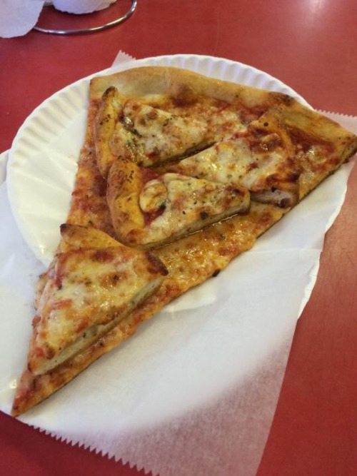 This pizza topped with pizza