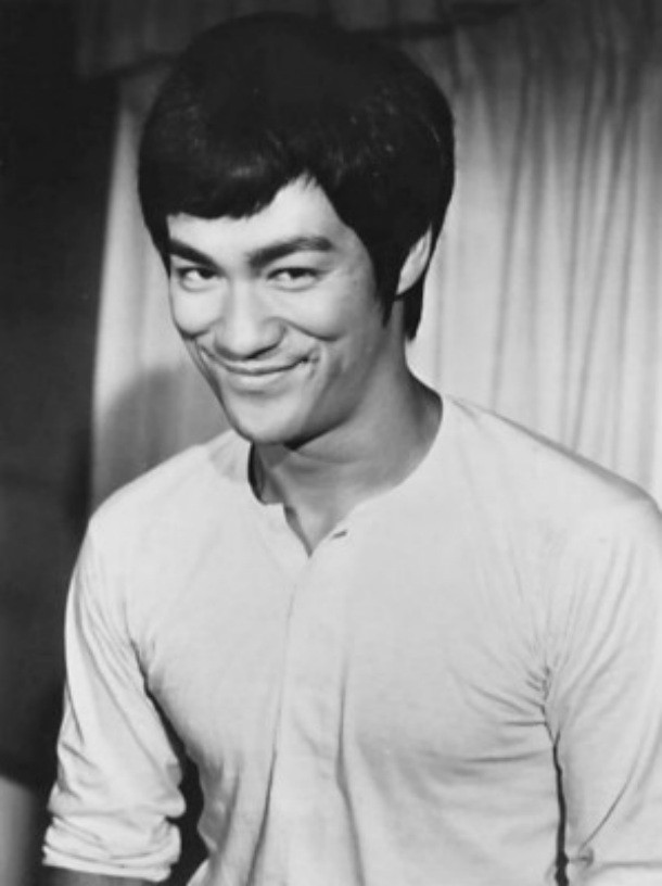 Bruce Lee developed an amazing trick, which you can find on YouTube, for showing off his speed: a person held a coin and closed his hand and, as he closed it, Lee would take it and could even swap the coin for another.