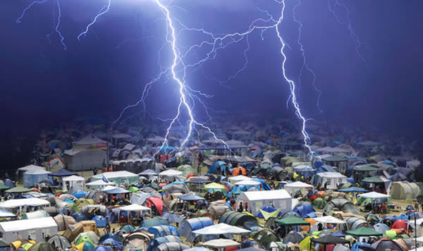 Two lightning strikes hit the 2015 Rock am Ring festival in the town of Mendig. Eight people from production teams were injured when the first strike hit the backstage area. Organizers later halted the concerts and offered visitors shelter in lightning-proof tents. Shortly before 4 am, lightning hit the festival's camping area, and another 25 people were injured. All of those injured had been taken to hospitals for observation and were in good health. None suffered a direct hit by lightning.