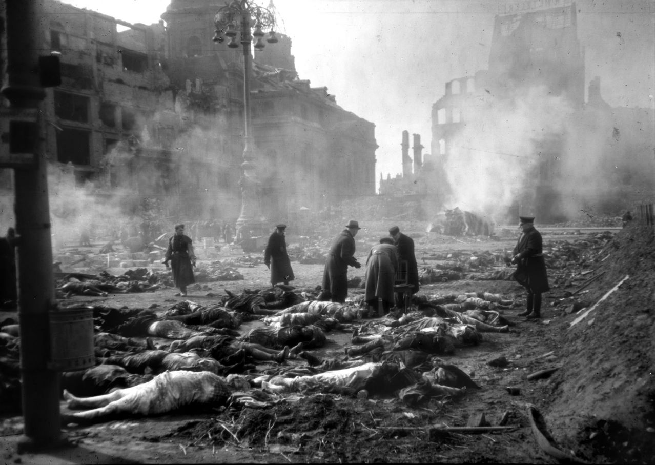 German civilians, air wardens and soldiers collect the civilian dead following an Allied bombing raid on Dresden. February 16, 1945.

“On about February 14th the Americans came over, followed by the R.A.F. their combined labors killed 250,000 people in twenty-four hours and destroyed all of Dresden — possibly the world’s most beautiful city. But not me.
After that we were put to work carrying corpses from Air-Raid shelters; women, children, old men; dead from concussion, fire or suffocation. Civilians cursed us and threw rocks as we carried bodies to huge funeral pyres in the city. ” Excerpt from page 2 of a letter to his folks, from Prvt. Vonnegut, U.S. Army.