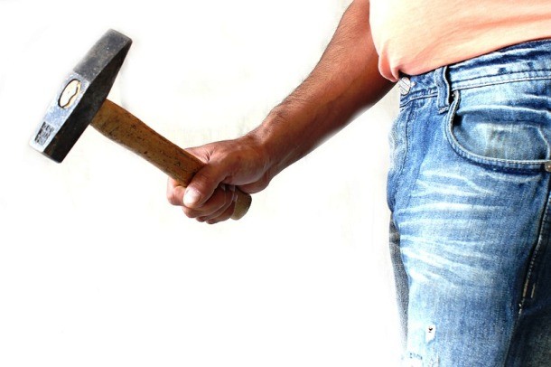 Glue a magnet to the bottom of your hammer so you do not have to hold your nails in your mouth.